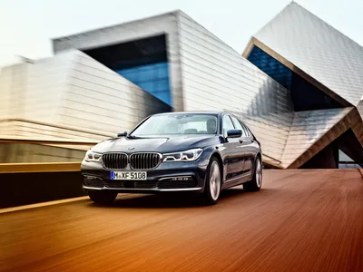 2012 BMW 7 серии статический передний угол ночь обои | 2012 BMW 7 Series Статический передний боковой угол Ночной склад картинки