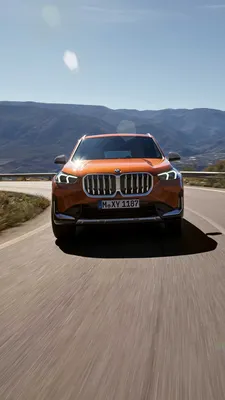 BMW X1 и пара обои | BMW X1 и пара стоковые фото картинки