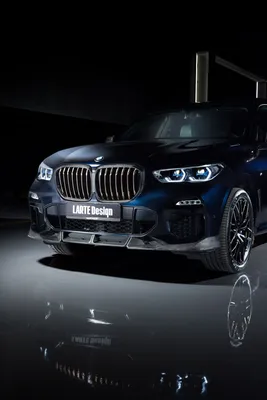 Черное на белом: BMW X5 G05 с линией тени на снегу картинки