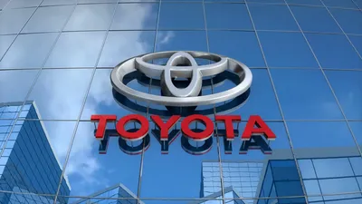 Редакция, логотип Toyota на стеклянном здании. Движущийся фон — VideoBlocks картинки