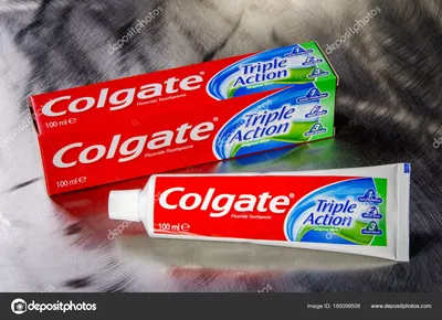 Капля зубной пасты из тюбика оригинальной мятной зубной пасты Colgate Triple Action на белом фоне Фото со стока - Alamy картинки