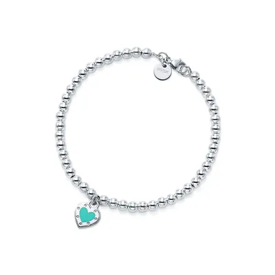 Браслет Return to Tiffany™ Love в виде шарика из серебра с подвеской в ​​виде сердца цвета Tiffany Blue® | Тиффани и Ко. картинки