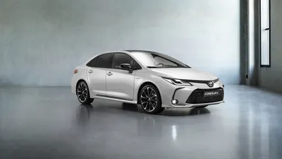 Фото Toyota Corolla Hybrid Sedan GR Sport, 2020 Weiß Autos 2560x1440 картинки