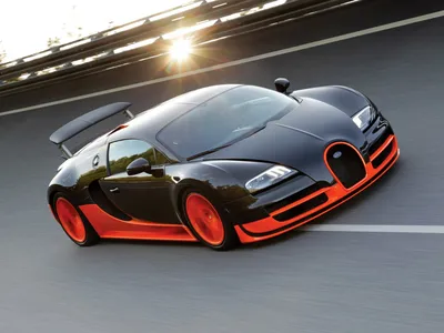 Bugatti veyron едет в лучах солнца - обои на рабочий стол картинки