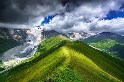 Фото Грузия Chkhutnieri Pass, Upper Svaneti гора Природа Небо снеге картинки