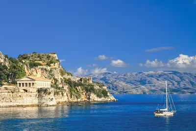 Фотографии Греция Corfu Море гора скалы Природа Небо берег картинки