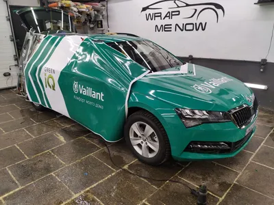 Оклейка рекламы на машину Skoda Superb для компании Vaillant в Москве, фото,  примеры картинки